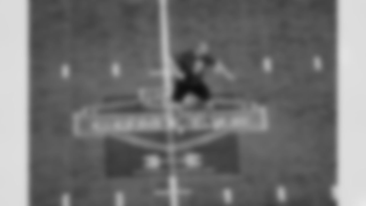 Lane Johnson participates in individual drills at the 2013 NFL Scouting Combine.