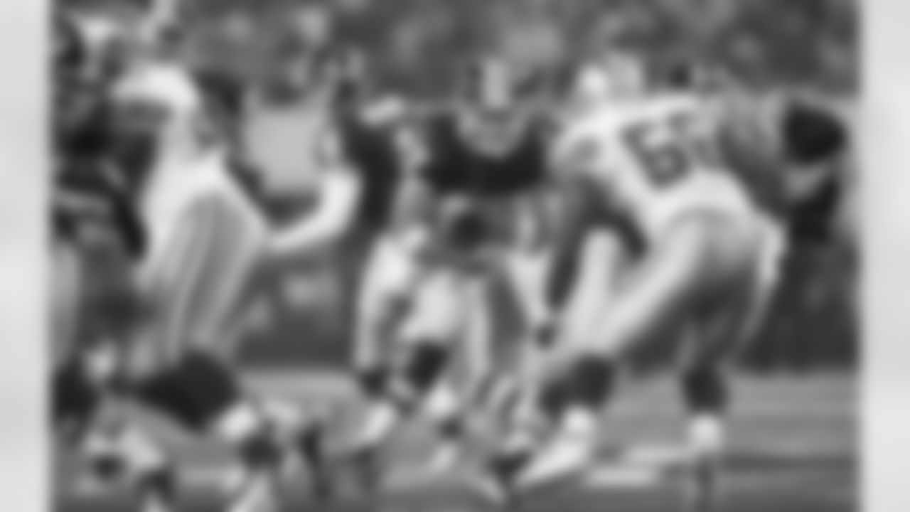 Chris Cooley, lining up at fullback for a handful of plays, fights for yardage.