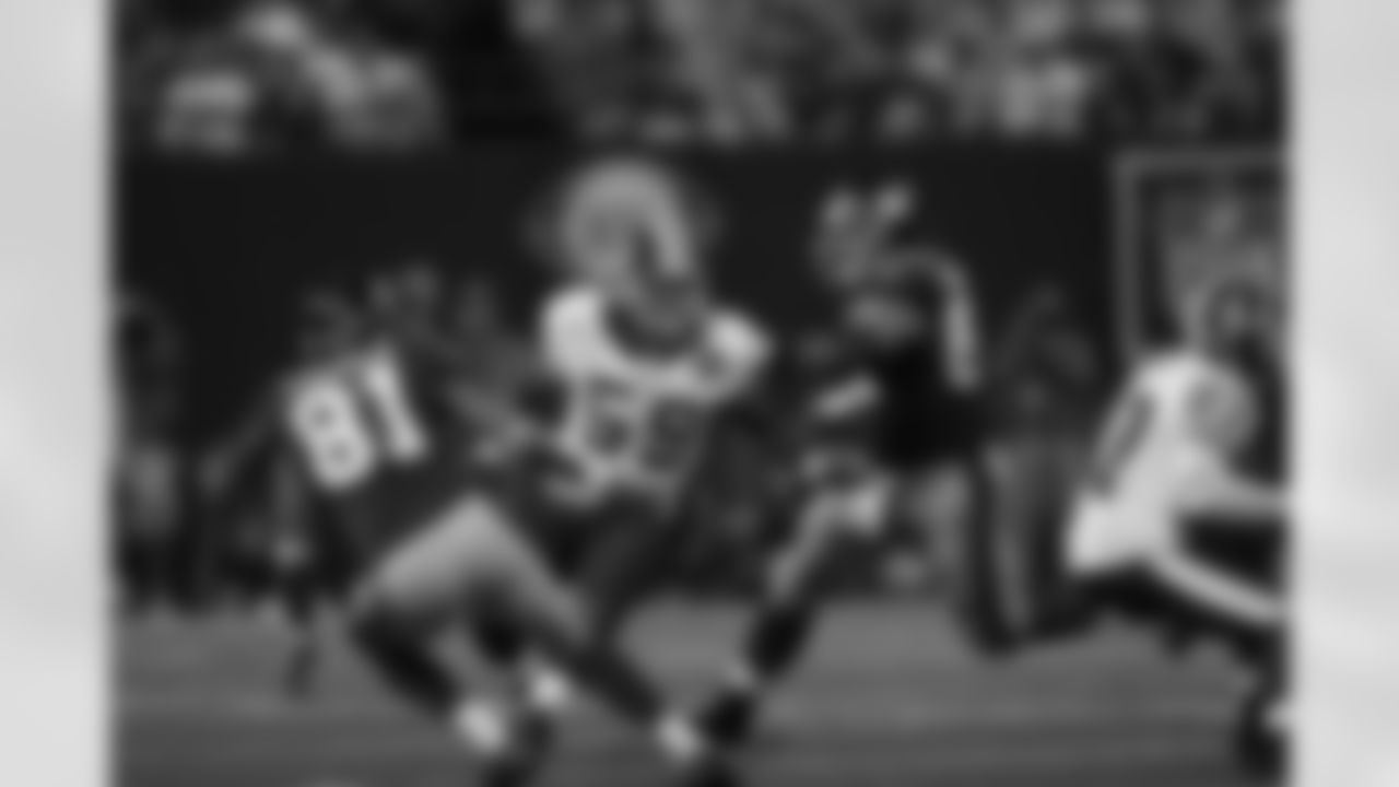 No. 11: Fletcher getting around the corner as he looked to add on another tackle against the New York Giants in the 2008 season opener. He would record a season-high 17 tackles on the day.