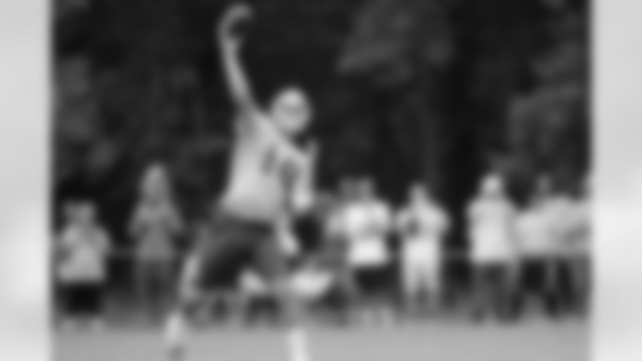 Richard Bartel throws a pass during camp (AP Photo)