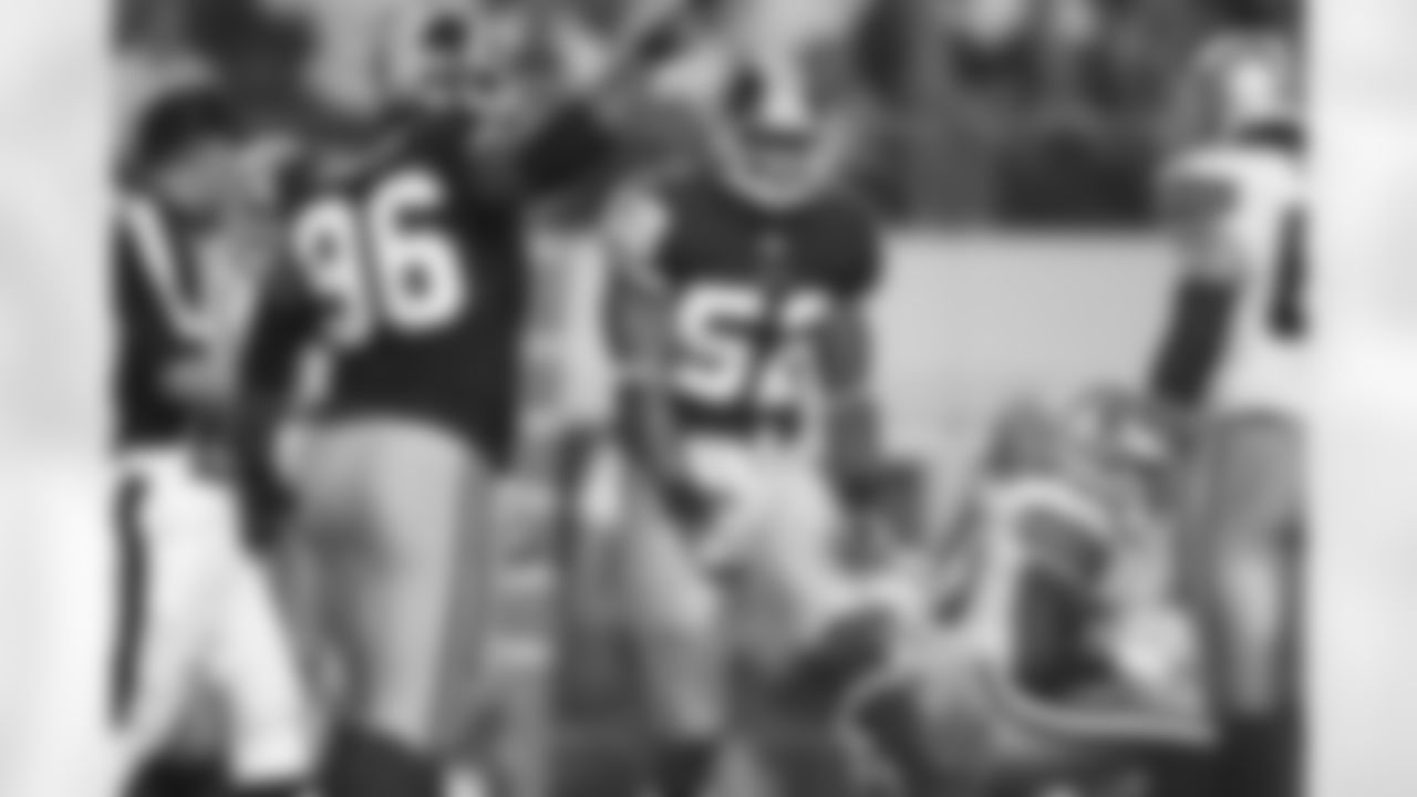 Rocky McIntosh celebrates a key third-down tackle in the first half.