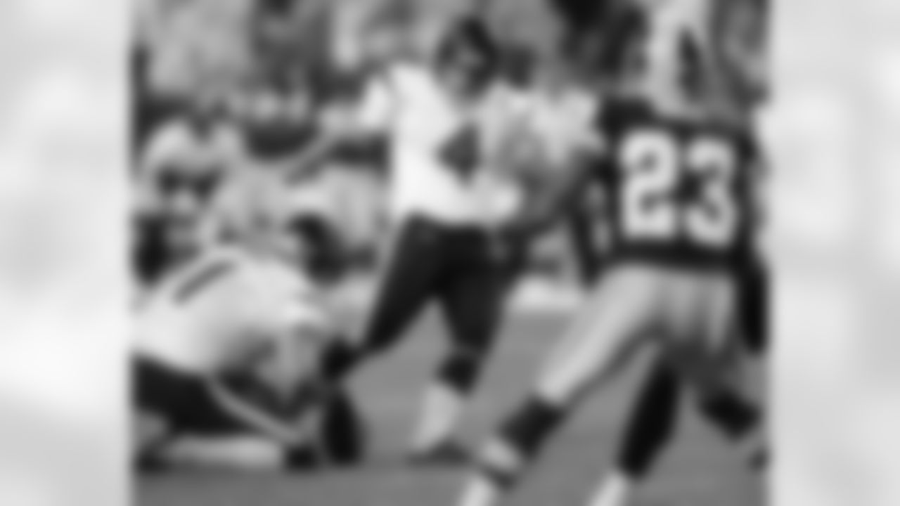 Texans kicker Neil Rackers kicks the game-winning field goal in overtime. (AP Photo)