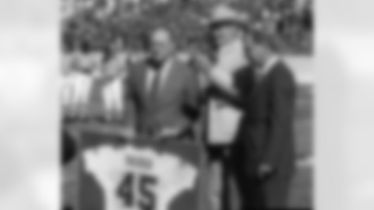 Sammy Baugh, at center, had his jersey retired at TCU. (AP Photo)