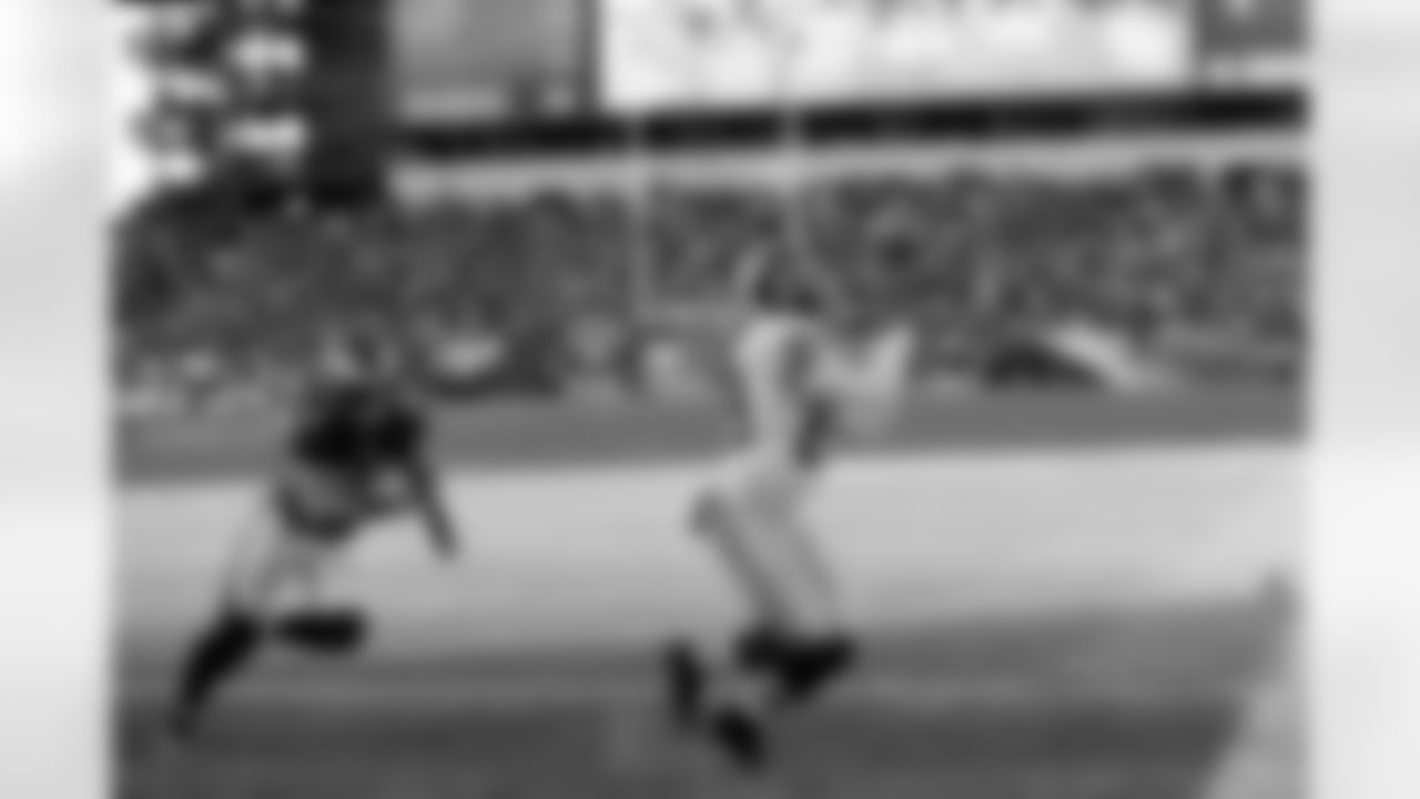 No. 6: Moss looking the ball into his hands as he would make a 22-yard touchdown catch against the Philadelphia Eagles in Week 16. It would be Moss' eighth and final touchdown grab of the season.