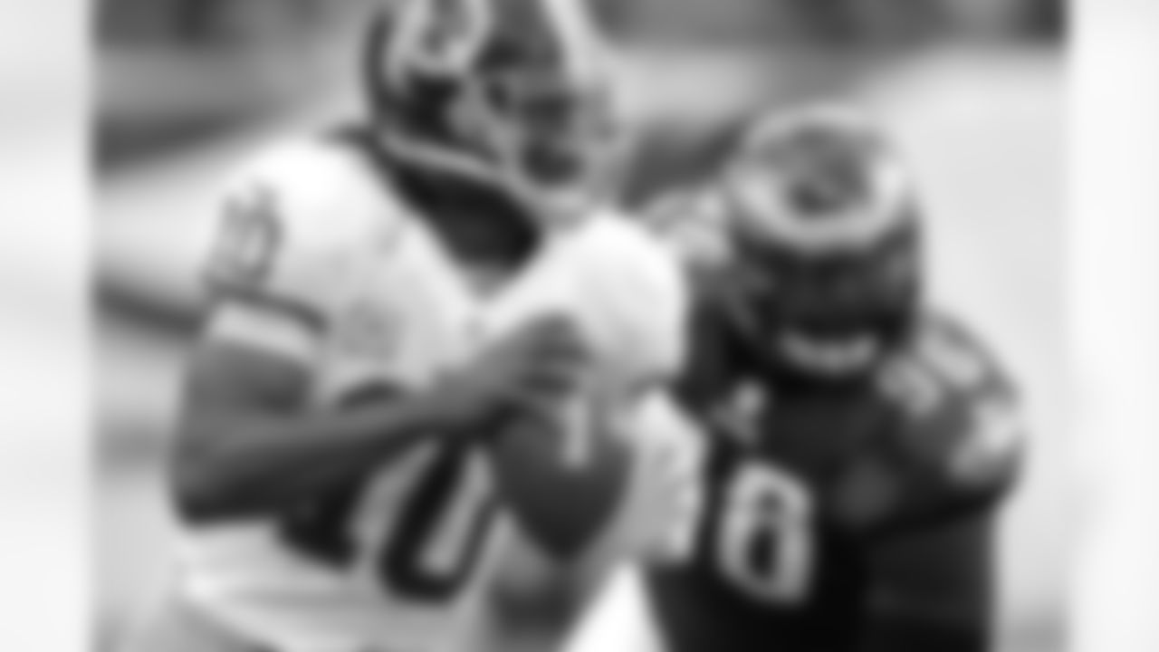Quarterback Robert Griffin III looks down the field for a receiver vs. the Eagles in Philadelphia Sunday, Nov. 17, 2013.
