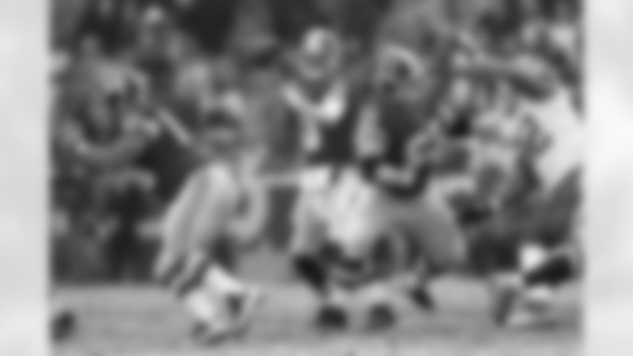 Quarterback Robert Griffin III drops back to pass vs. the Chiefs on Sunday, Dec. 8, 2013.
