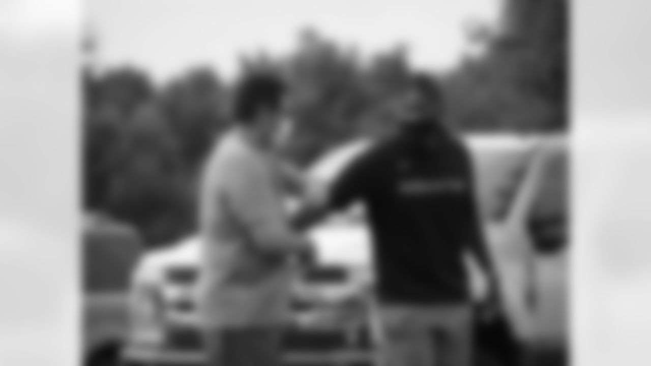 Quarterback Dwayne Haskins greets head coach Ron Rivera at the Washington Football Team facility on Thursday, July 23, 2020.
