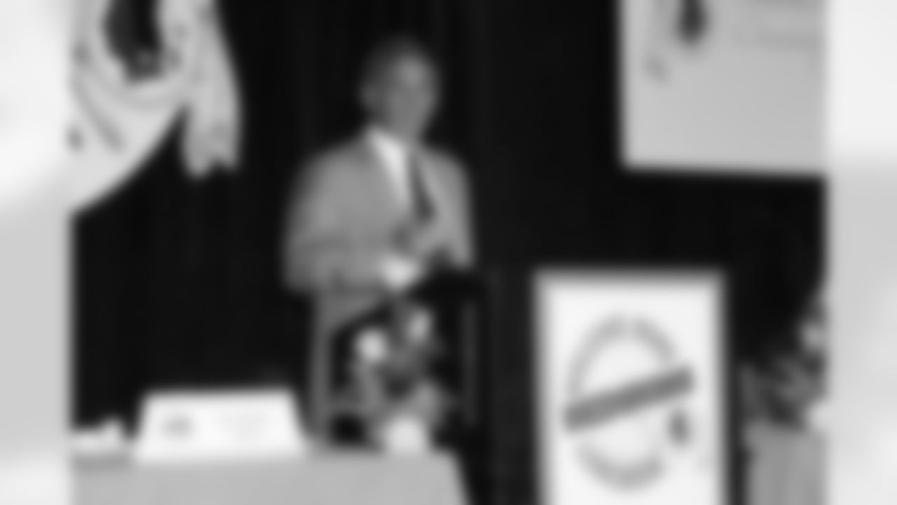 Head Coach Mike Shanahan gives a speech during the luncheon (Ned Dishman Photo)