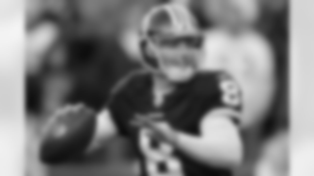 Rex Grossman threw two touchdown passes and an interception in the game.
