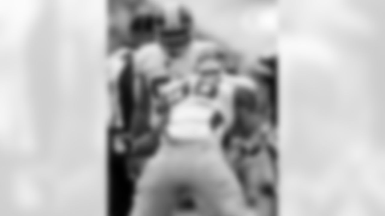No.9: Midseason Form: Linebacker Brian Orakpo celebrates after sacking quarterback Aaron Rodgers. Orakpo had five tackles against the Packers and has three sacks in the first five games.