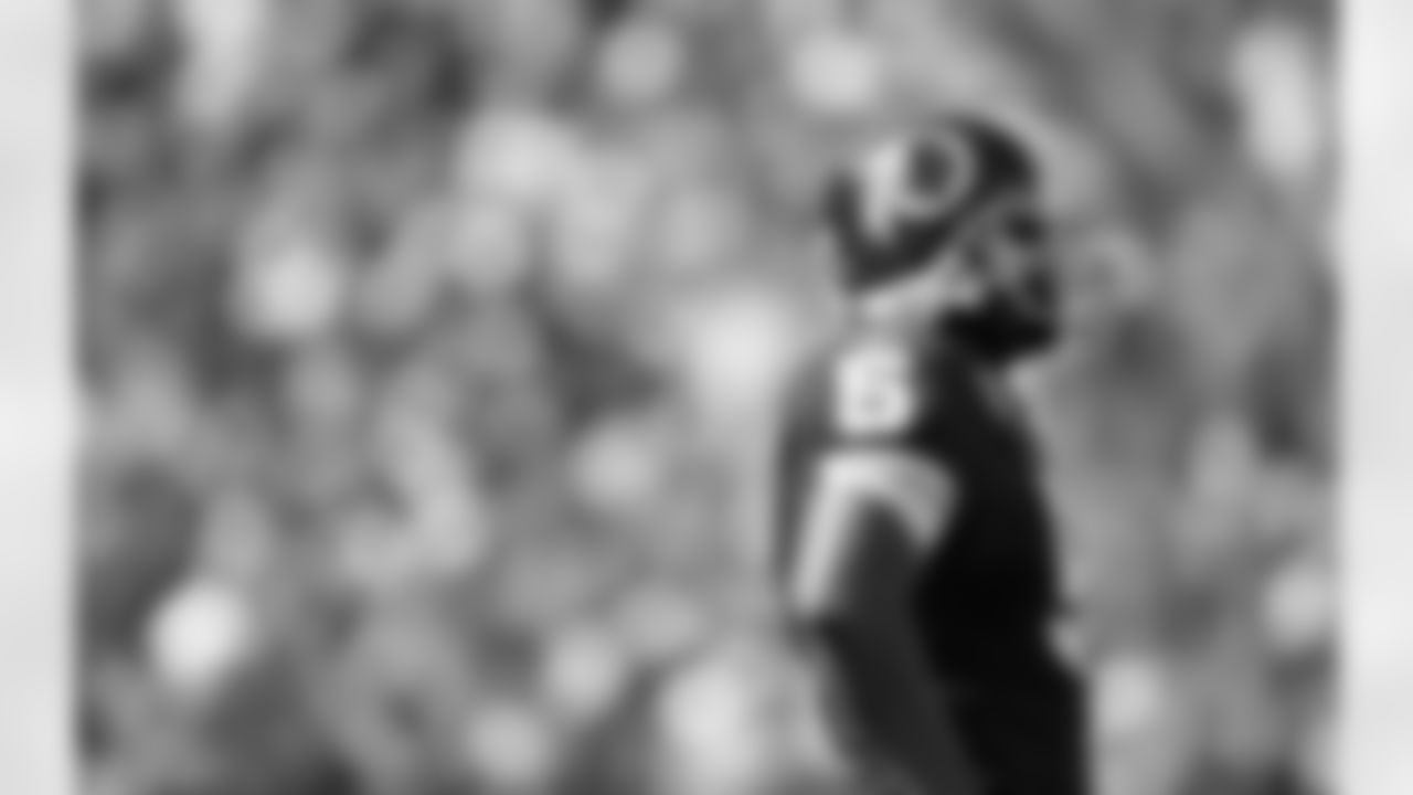 Donovan McNabb surveys the field during the first half. (AP Photo)