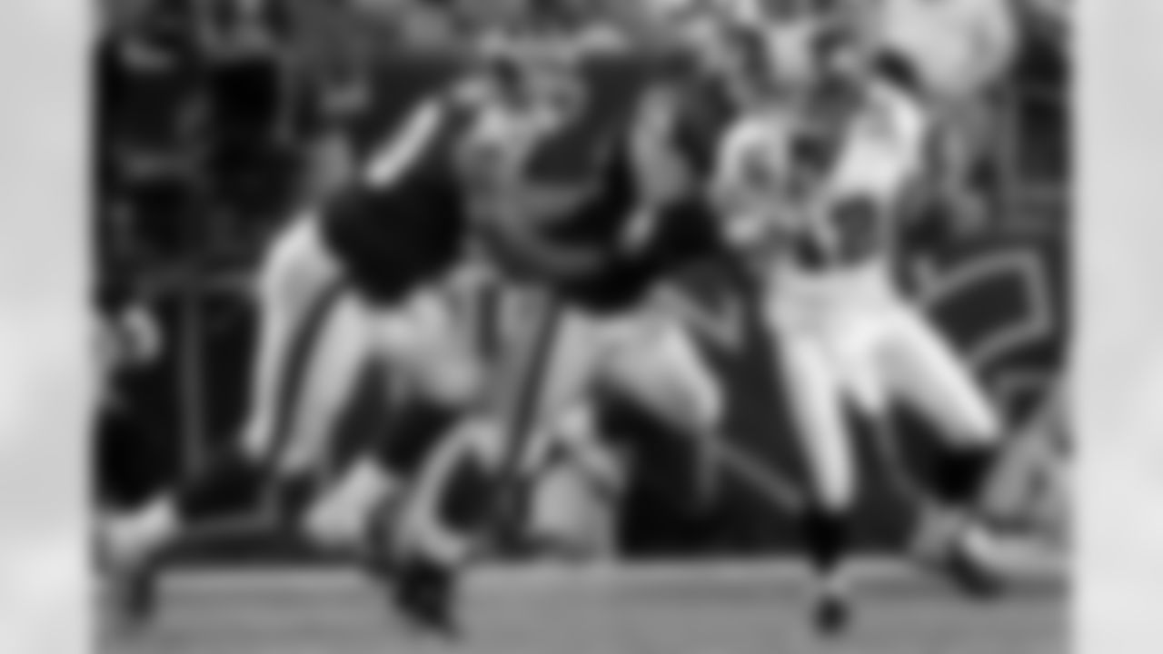 Kedric Golston sacks Rudy Carpenter in the second half