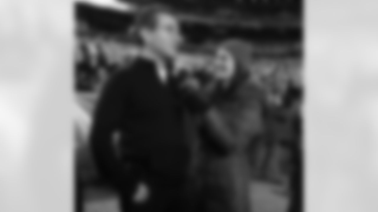 Daniel Snyder is interviewed on the sidelines during the game.