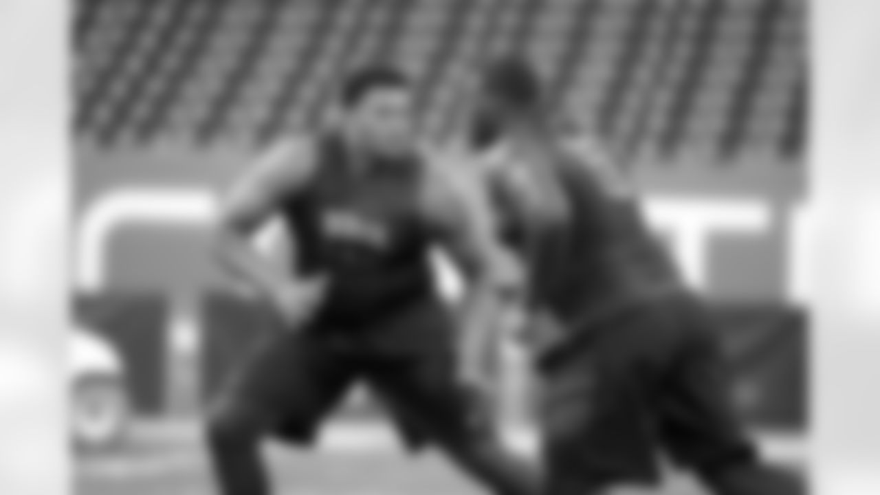 Miami offensive lineman Ereck Flowers and Florida State offensive lineman Cameron Erving run a drill during the 2015 NFL Scouting Combine at Lucas Oil Stadium on Friday, February 20, 2015 in Indianapolis, IN. (AP Photo/Johnny Vy)