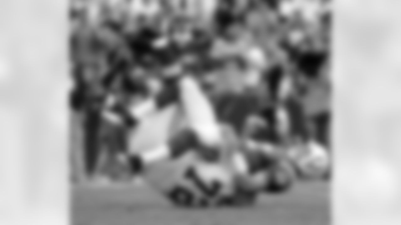 Indianapolis Colts quarterback Andrew Luck is sacked by Washington Redskins defensive end Stephen Bowen during the first half of an NFL preseason football game Saturday, Aug. 25, 2012, in Landover, Md. (AP Photo/Richard Lipski)