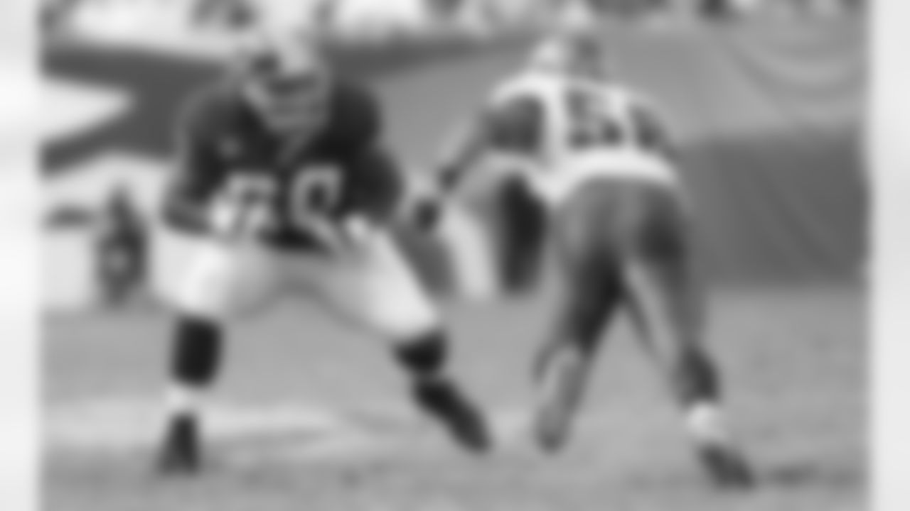 Chris Samuels matched up against Philly's Trent Cole. (Ned Dishman Photo)