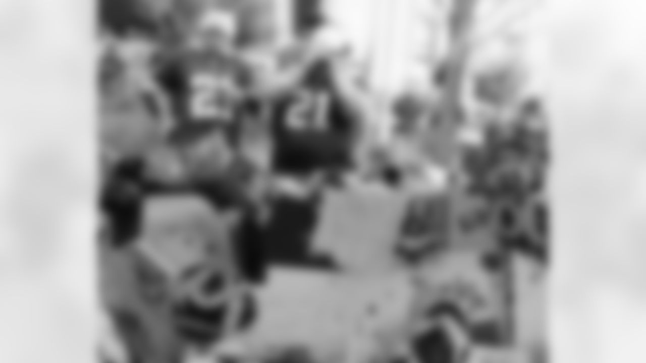 Fans take photos to capture their own memories.