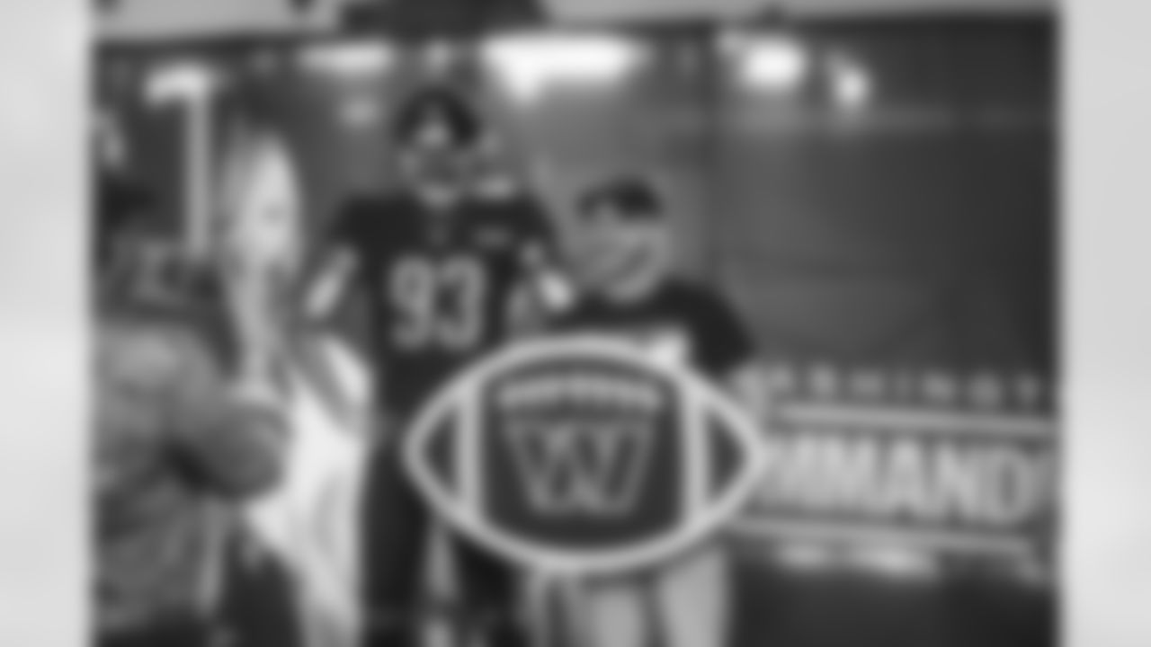 The Washington Commanders football team takes part in the Capital Pride Festival in Washington, DC on June 12, 2022.