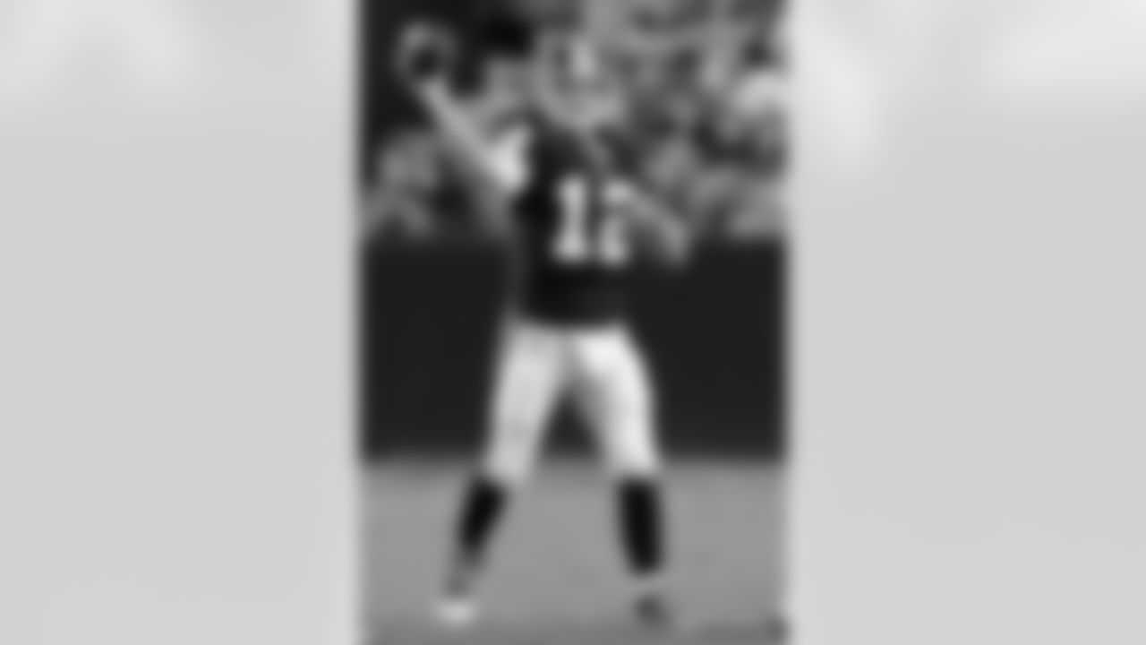 John Beck throws the ball