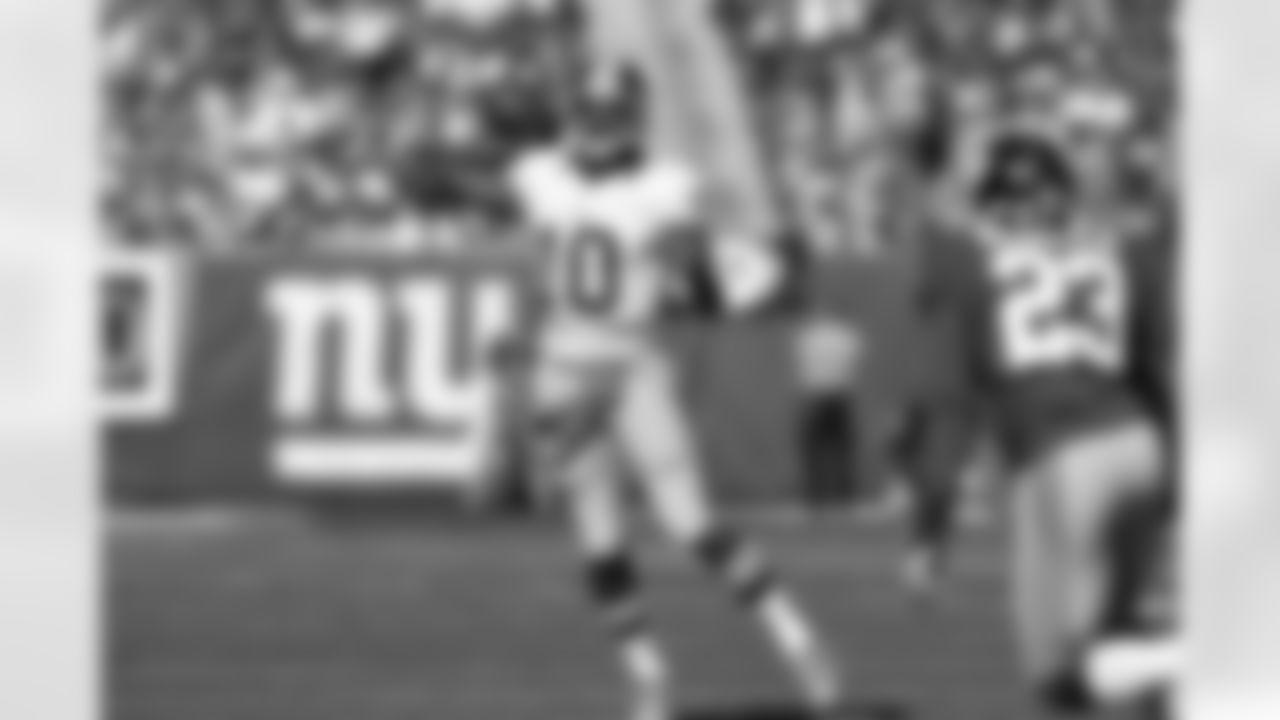 Redskins QB Robert Griffin III throws a pass in the first half.