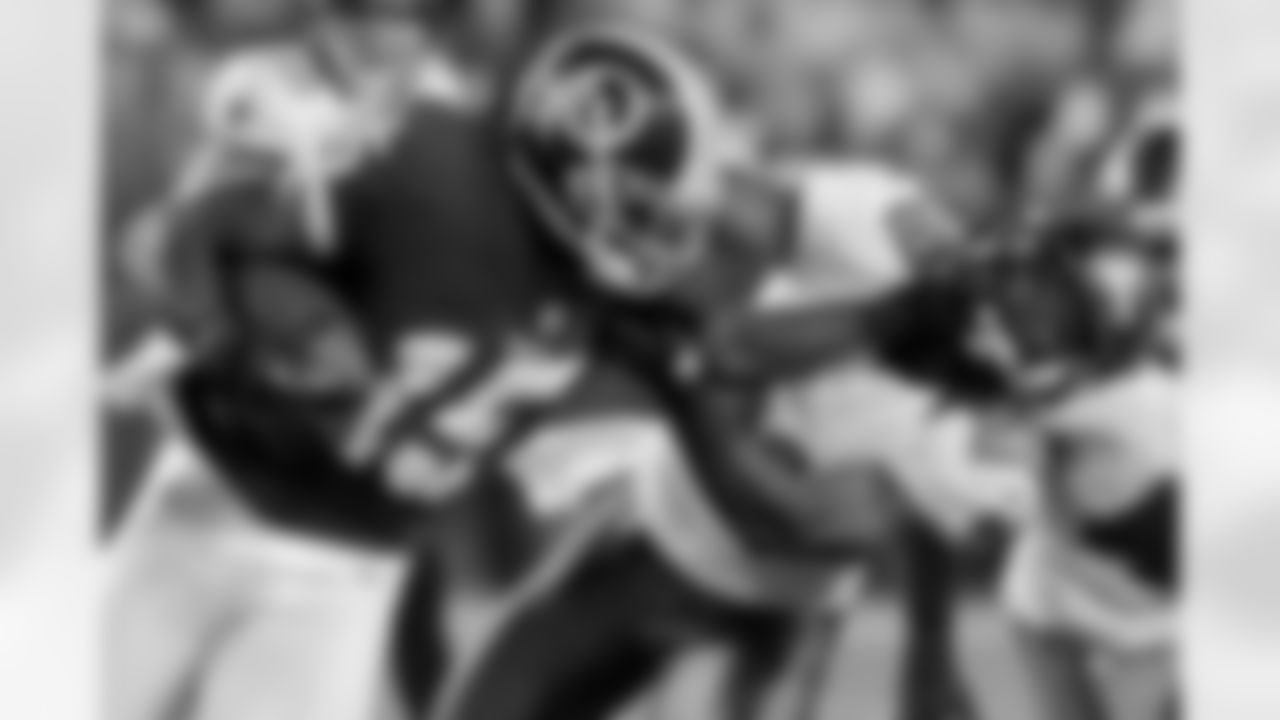 No.3: Putting The Team On His Back. Redskins' WR Josh Morgan stiff arms his way past Tampa Bay Buccaneers cornerback Leonard Johnson in Week 4 of the regular season.