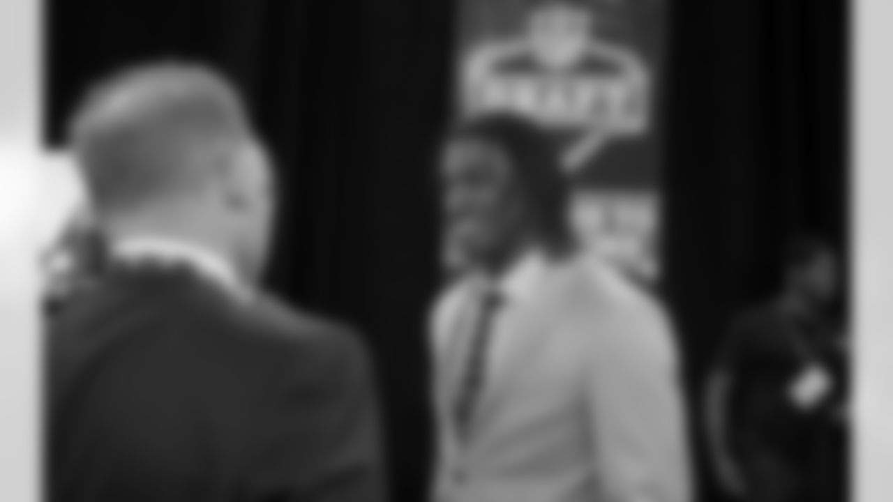 Chatting prior to the NFL Draft.