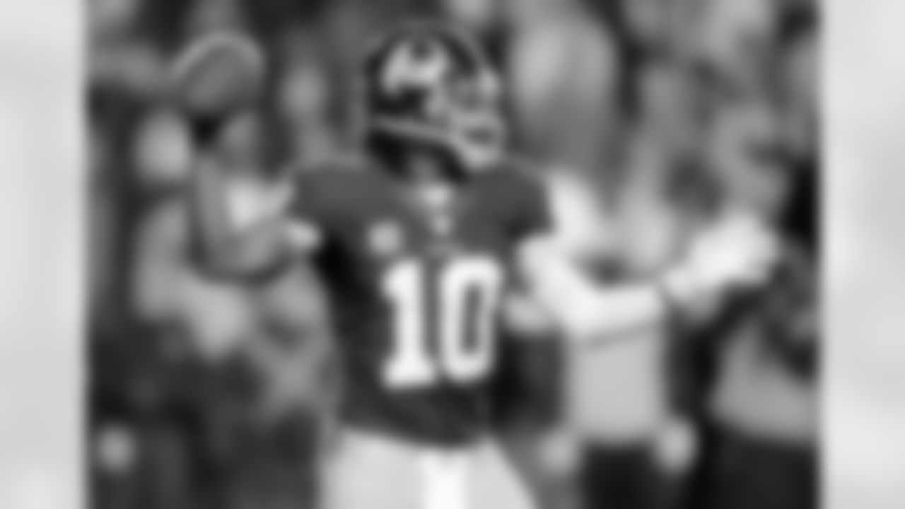 Redskins quarterback Robert Griffin III was very accurate in the first half vs. the Giants. Griffin was 16 of 17 for 149 yards and a touchdown.
