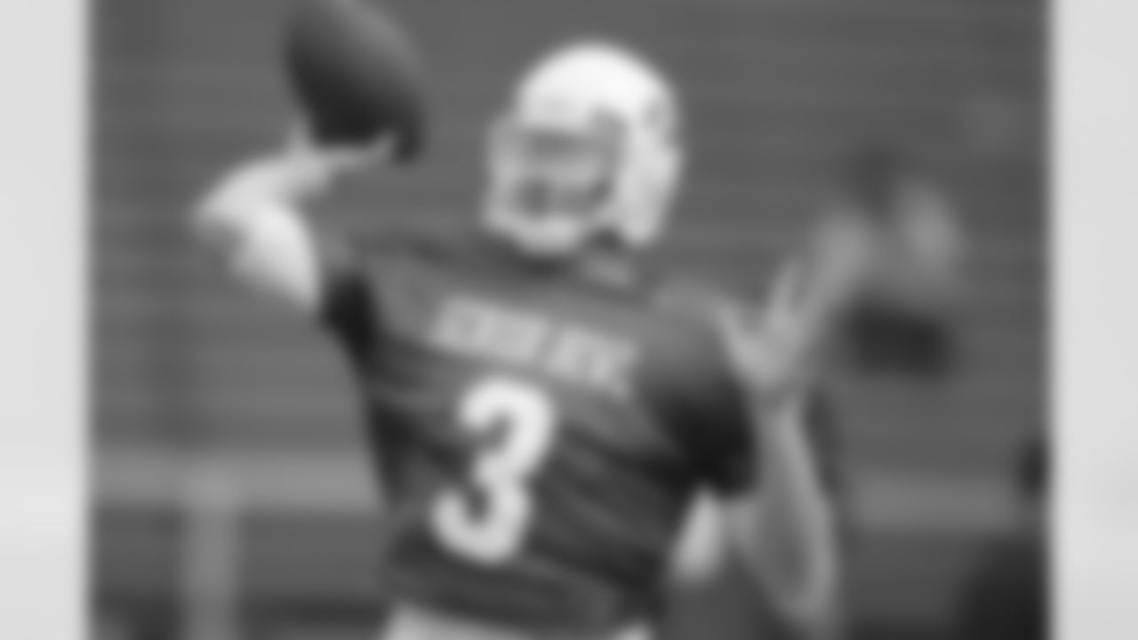 Oklahoma State quarterback Brandon Weeden fires a pass downfield.