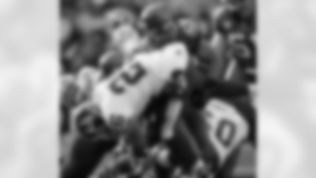 No. 9: Tapp attempting to contain Washington Redskins running back Clinton Portis during a playoff game in 2008.
