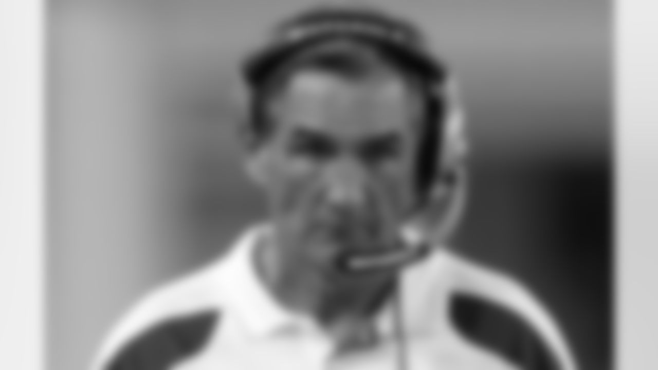 Mike Shanahan patrols the sidelines at Cowboys Stadium.