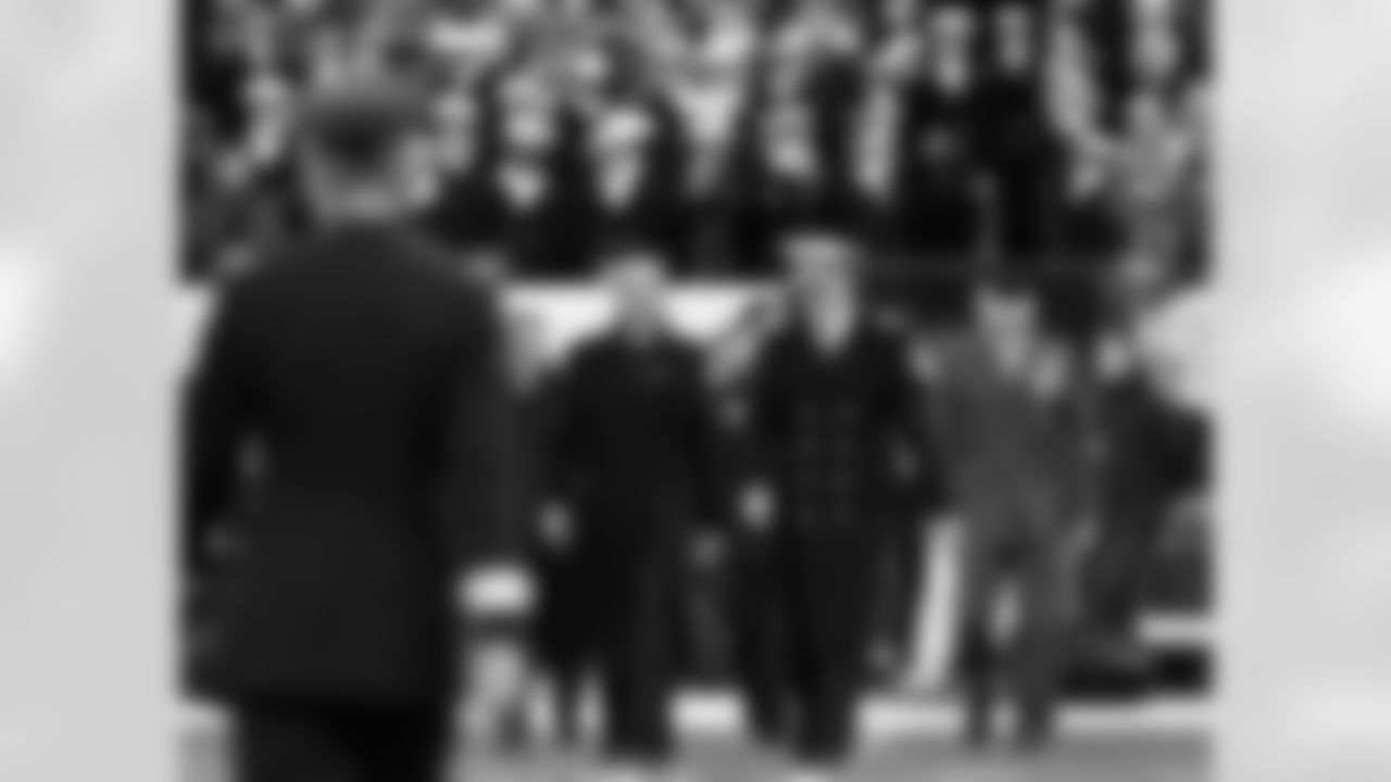 President Barack Obama walks onto the field for the pre-game coin toss.