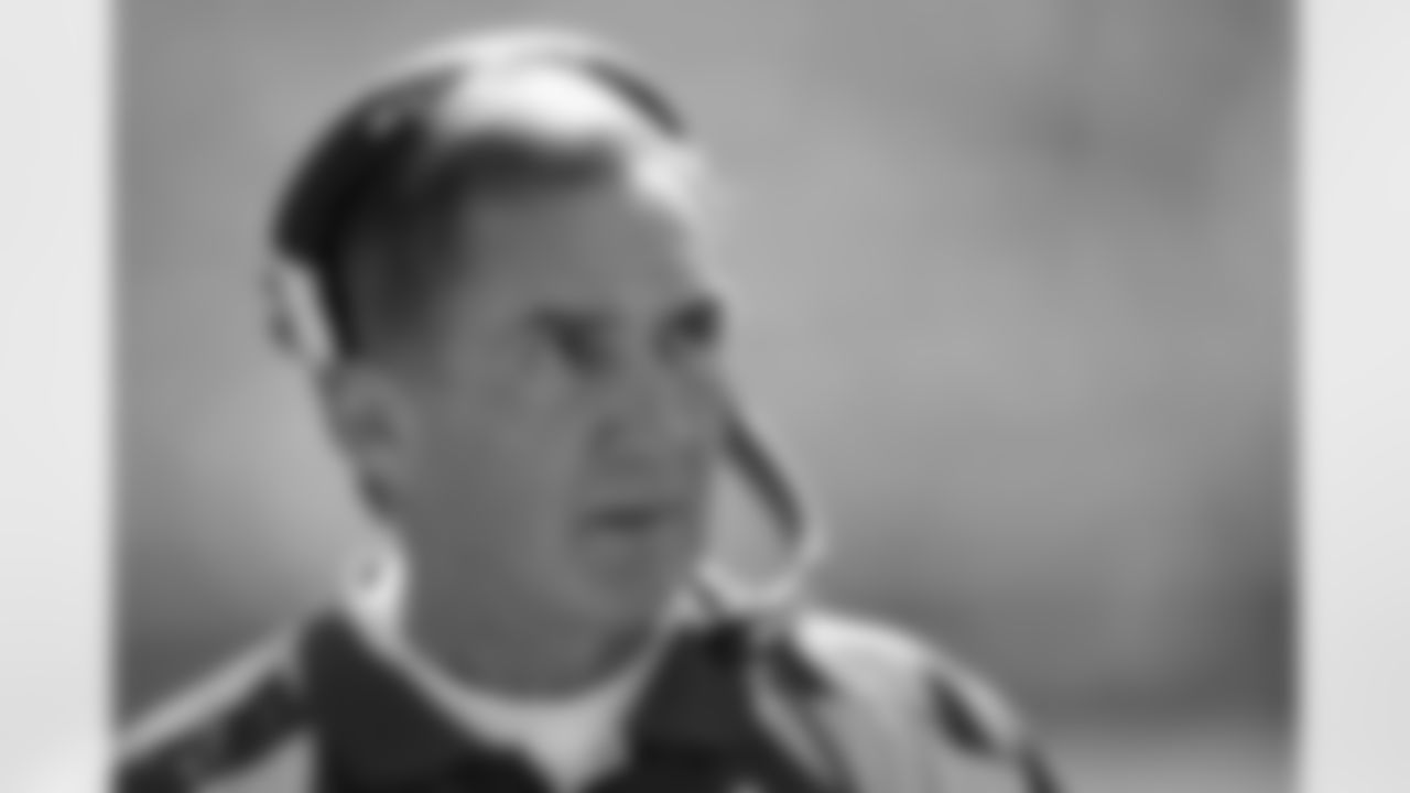 Mike Shanahan looks on during the first half.