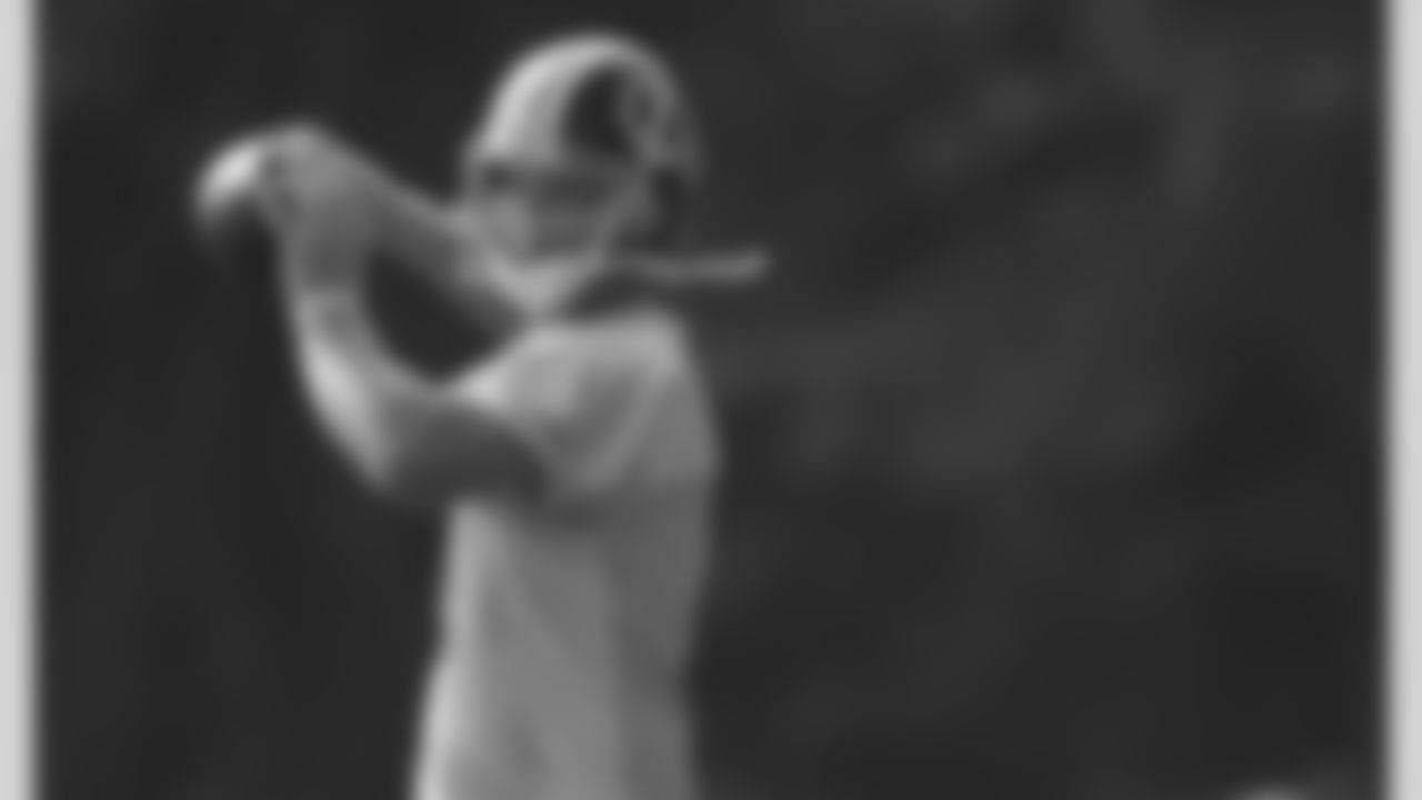 Quarterback John Beck eyes a target downfield.