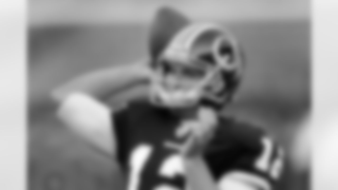 John Beck warms up before preseason game against the Buccaneers