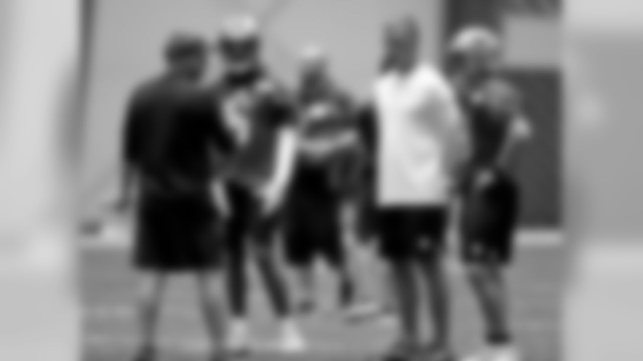 New Orleans Saints head coach Sean Payton talks to his quarterbacks during training camp practice at the team's headquarters in Metairie on Monday, August 19, 2019.