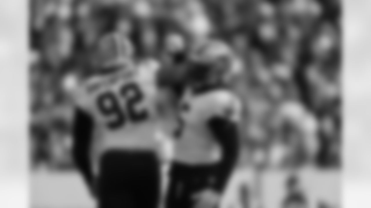 Check out photos of New Orleans Saints defensive end Marcus Davenport in action during the 2021 NFL season.