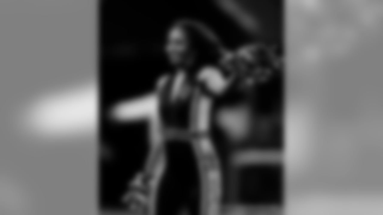 Check out photos of Saintsations member Deneé in action during 2019 Saints NFL season.