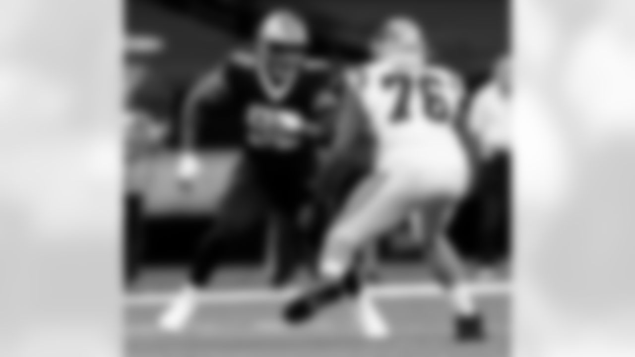 Check out photos of New Orleans Saints defensive end Marcus Davenport in action during the 2020 NFL season.