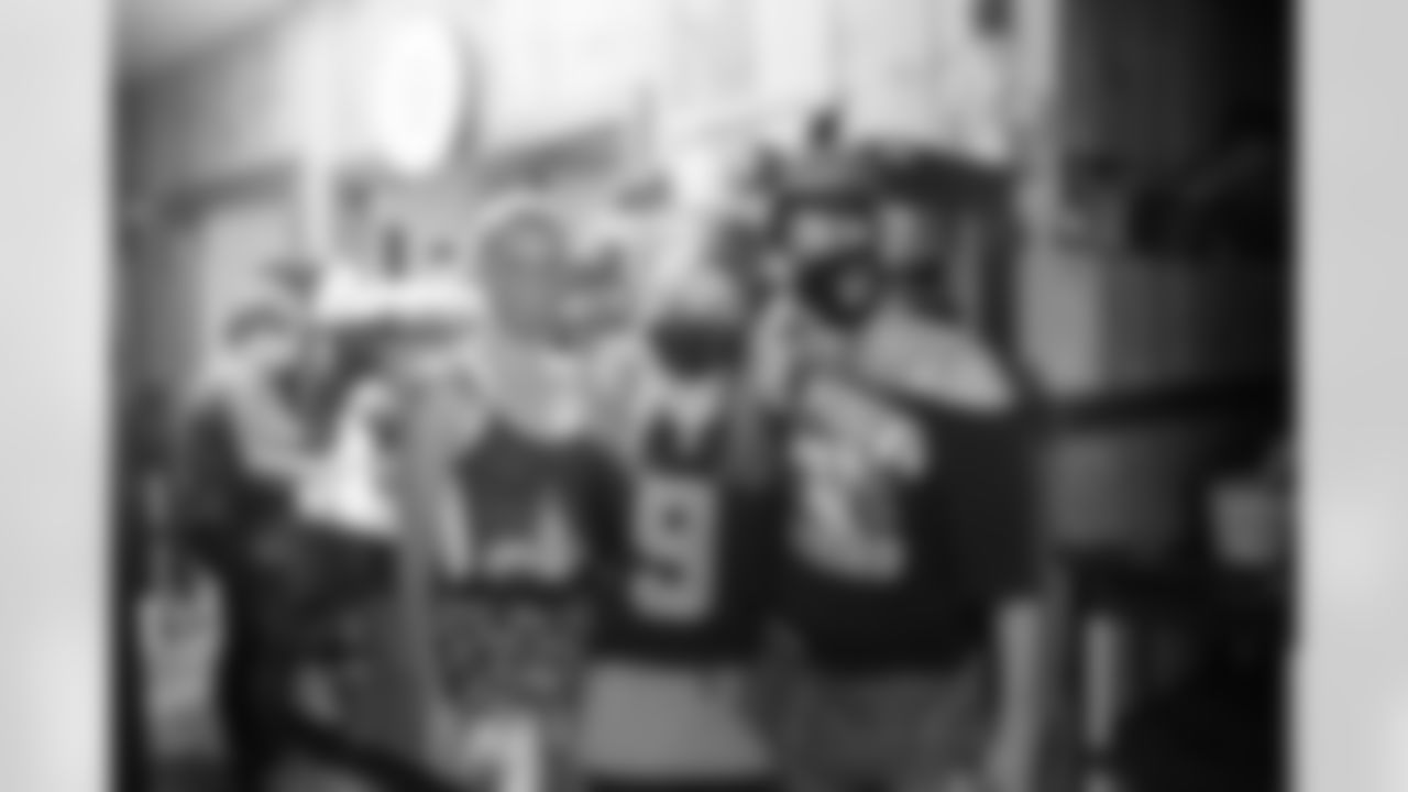 New Orleans Saints fans cheer on the team from Gretna as the Saints take on the Tampa Bay Buccaneers in week 1 of the 2020 NFL season.