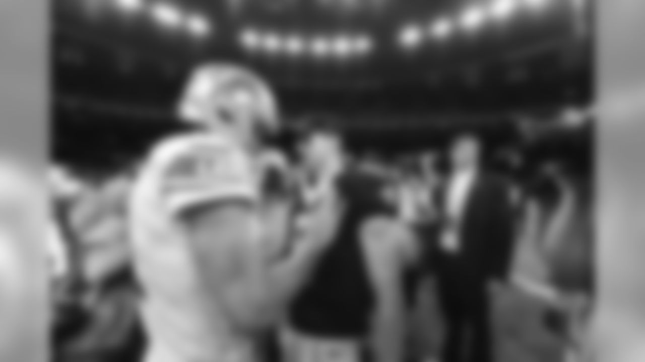 New Orleans Saints quarterback Drew Brees (9), right, and Detroit Lions quarterback Matthew Stafford greet each other after an NFL football game in New Orleans, Sunday, Oct. 15, 2017. The Saints won 52-38. (AP Photo/Bill Feig)