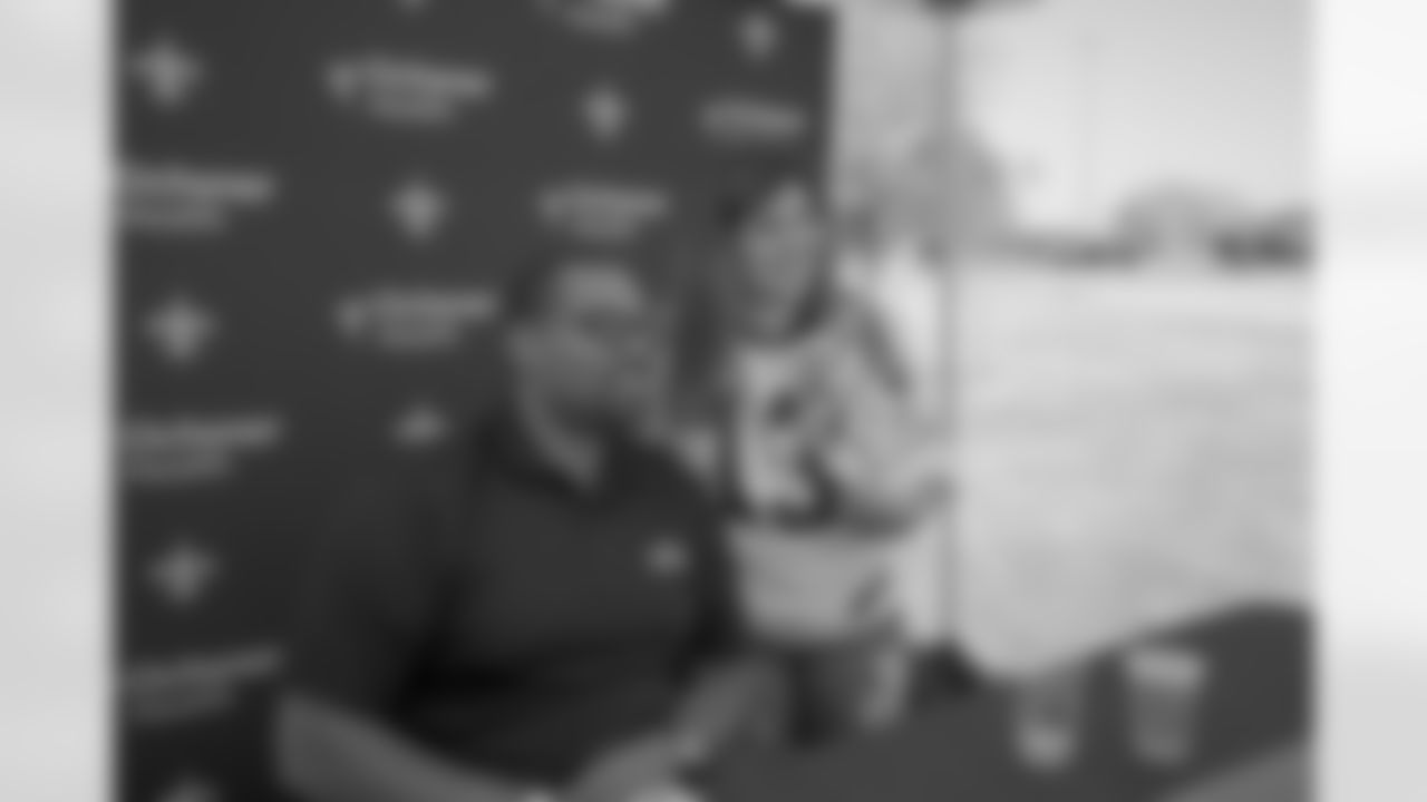 Saints Hall of Fame inductees Roman Harper and Jahri Evans meet and greet Saints fans at Saints Fan Fest.