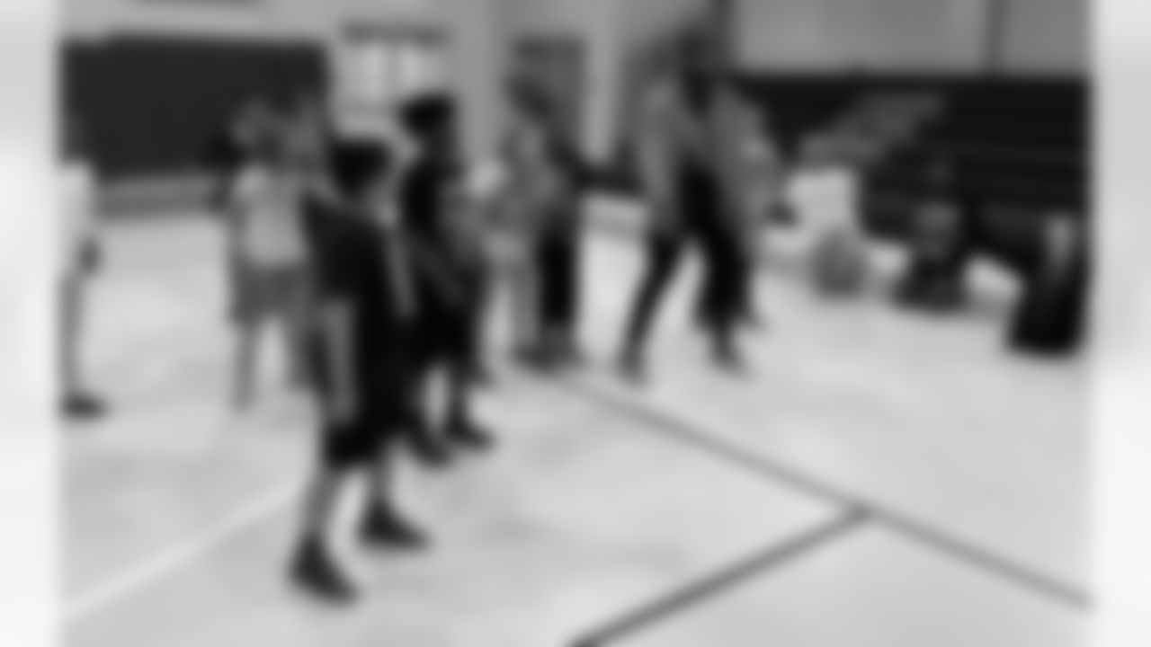 New Orleans Saints cornerback Paulson Adebo surprised students at Bricolage Academy on Monday, October 30, joining in the fun during their physical education class.
