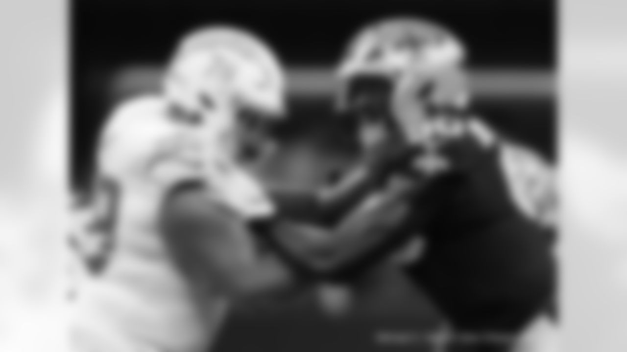 New Orleans Saints players in action during their 2022 Preseason Week 3 game against the Los Angeles Chargers.