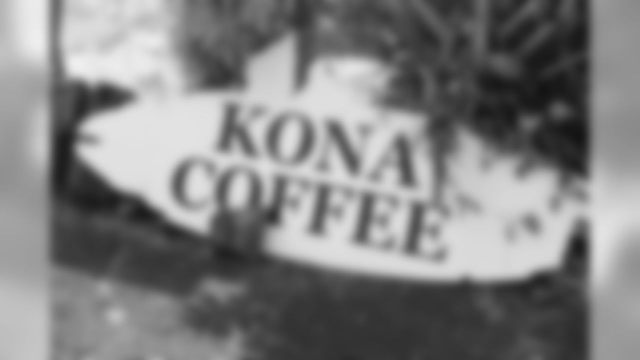 A sign offering Kona coffee is seen at a shop near the McCandless Ranch, Wed, Jan. 16, 2019, in Hookena, Hawaii. NFL football center Max Unger grew up on his family's McCandless Ranch, a 7000 acre working cattle ranch that starts on the slopes of Mauna Loa stretches down to Hookena Beach. (Marco Garcia for the New Orleans Saints)