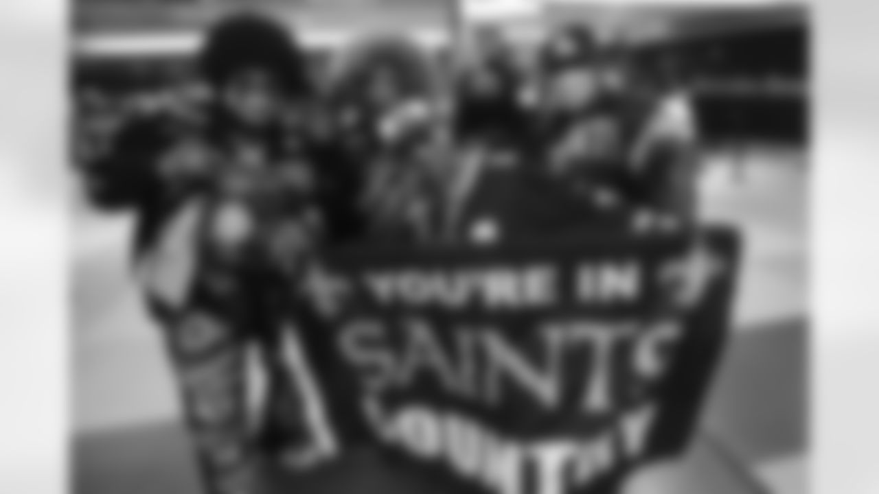 New Orleans Saints fans cheer on the team from inside the Mercedes-Benz Superdome against the Chicago Bears in the Wild Card round of the 2020 NFL playoffs.