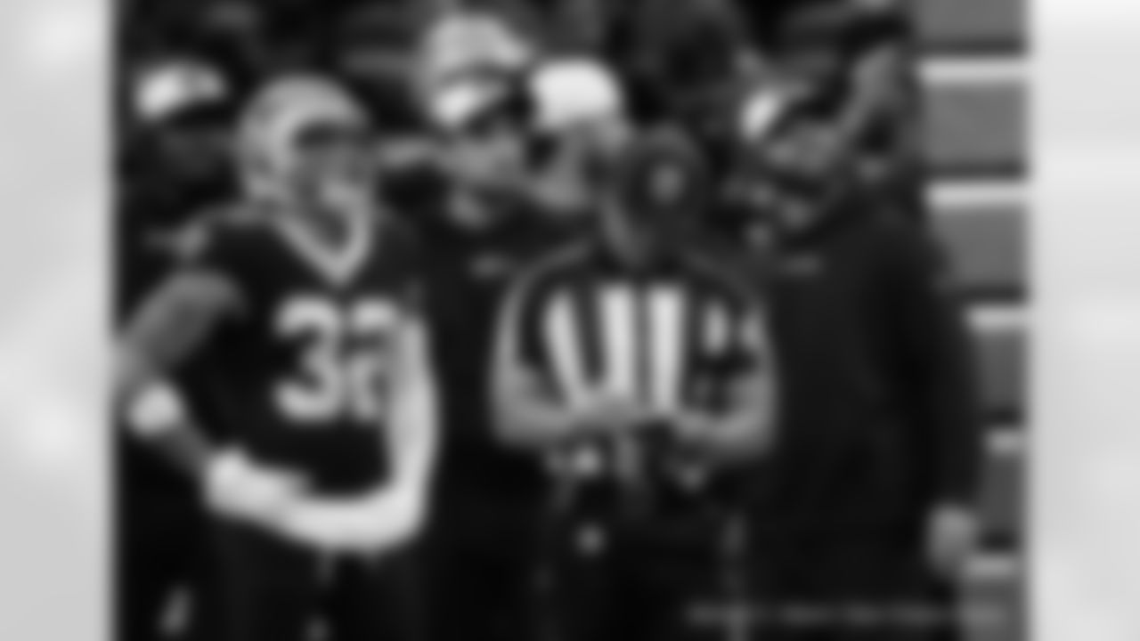 New Orleans Saints players in action during their 2022 Week 15 game against the Atlanta Falcons.