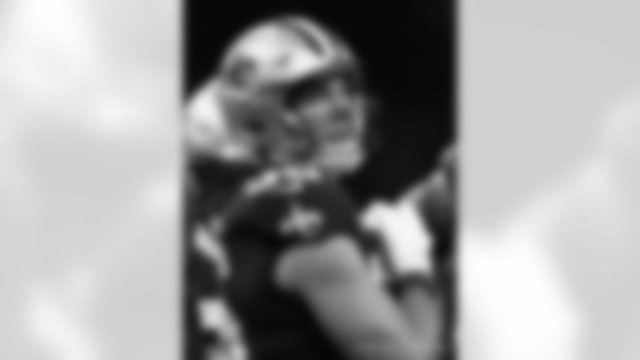 New Orleans Saints players in action during their 2022 Preseason Week 3 game against the Los Angeles Chargers.
