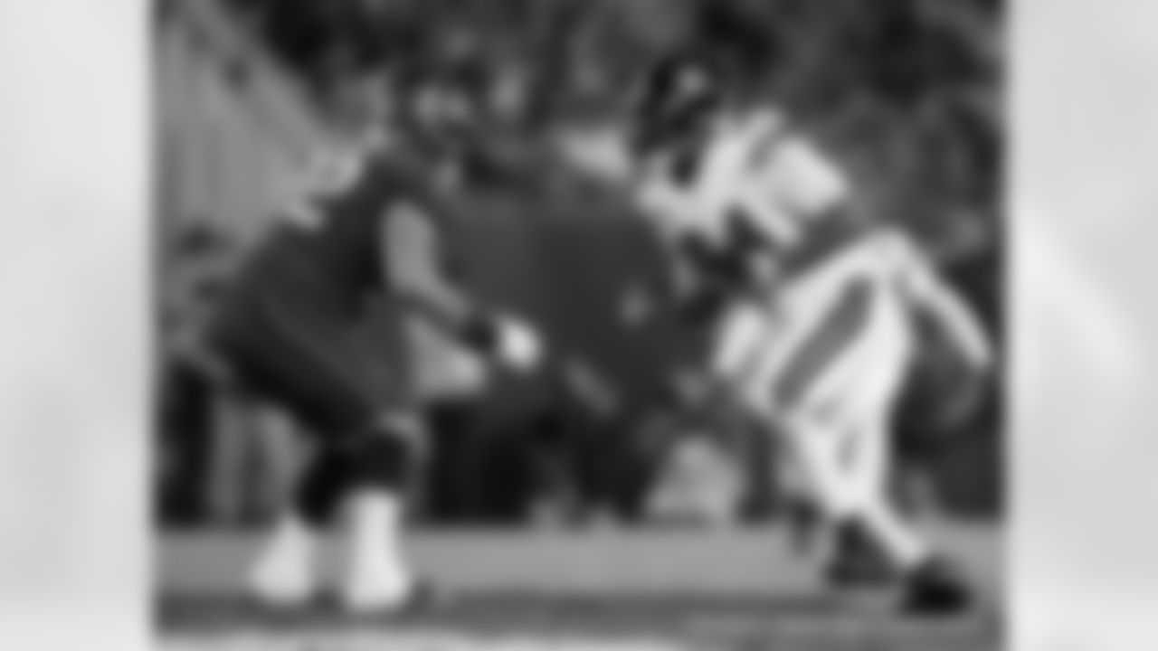 New Orleans Saints players in action during their 2022 Week 13 game against the Tampa Bay Buccaneers.