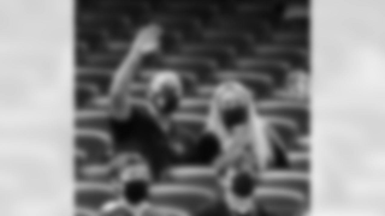 New Orleans Saints fans and employees cheer on the team from inside the Mercedes-Benz Superdome as the Saints take on the Green Bay Packers in week 3 of the 2020 NFL season.