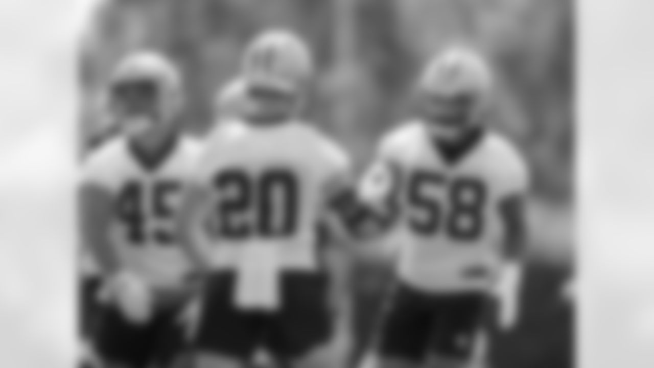 New Orleans Saints linebackers Pete Werner and Eric Wilson get ready for a drill during the team's 2022 OTA practices on June 2, 2022 at the Ochsner Sports Performance Center.